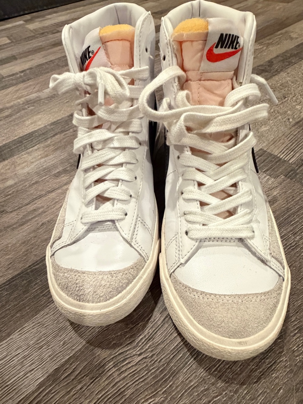 Nike Women’s White High-Top Sneakers with Orange Tongue Detail